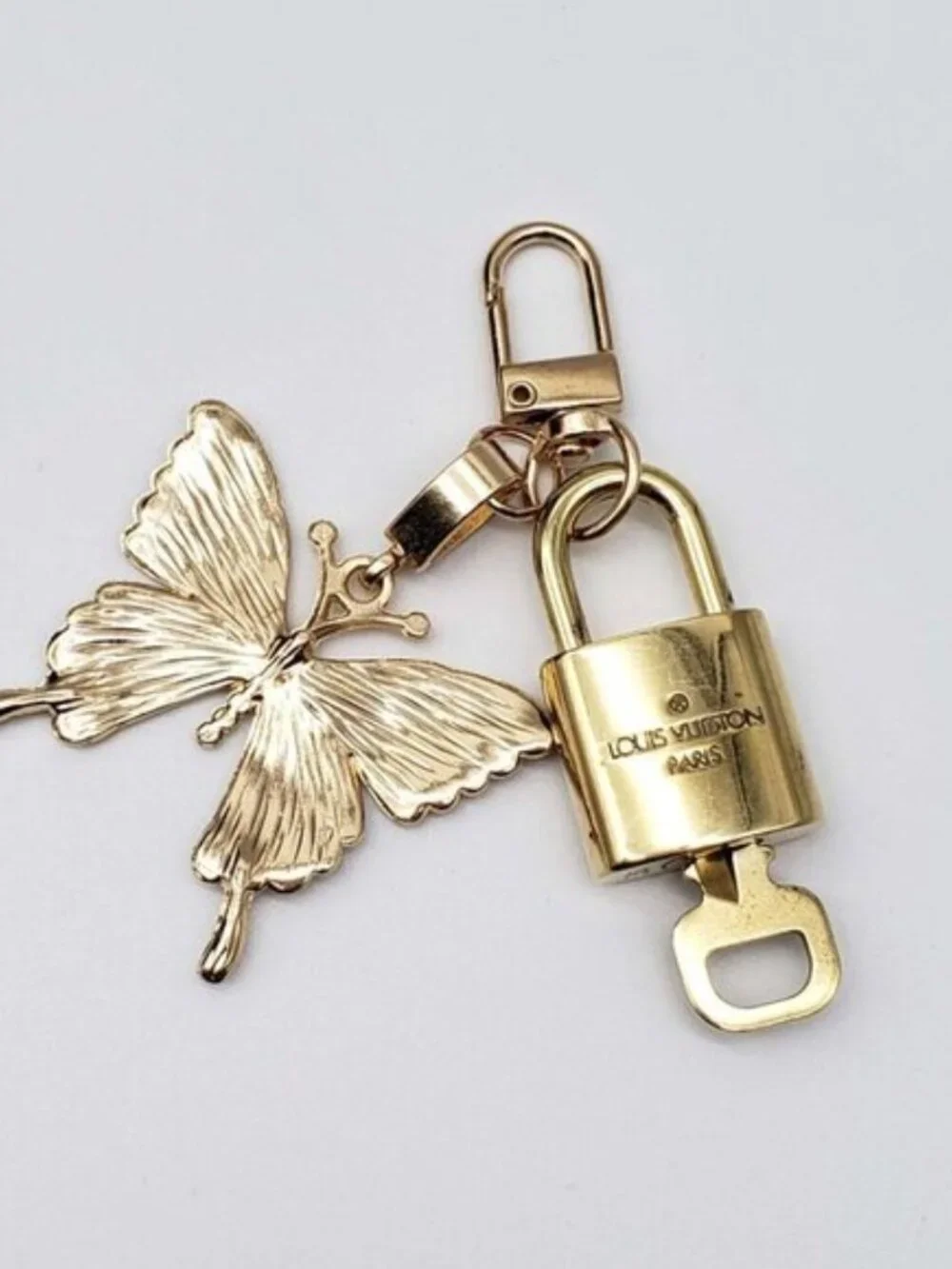 LV Authentic Gold Padlock 🔒 Key Set w/ Unbranded Butterfly Keychain Charm